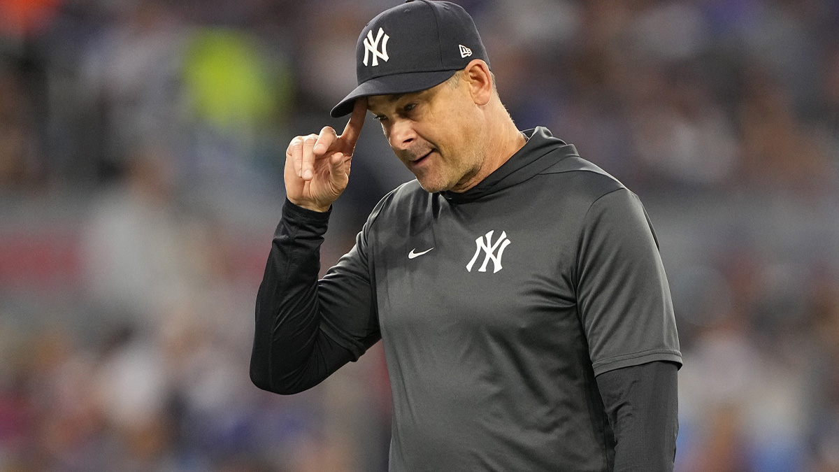 New York Yankees manager Aaron Boone walks to the dug out after making a pitching change against the Toronto Blue Jays during the fifth inning at Rogers Centre.