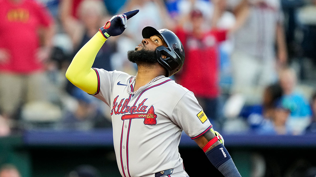 Atlanta Braves designated hitter Marcell Ozuna (20) celebrates after hitting a home run during the sixth inning against the Kansas City Royals at Kauffman Stadium.