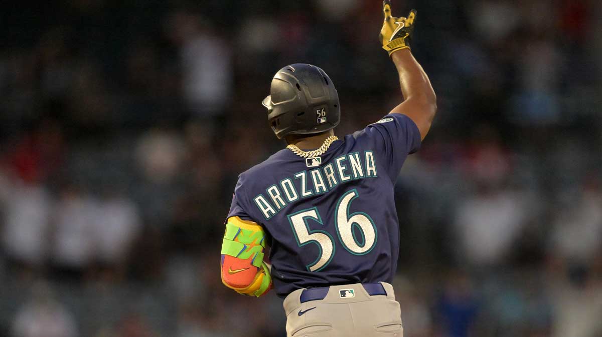 Mariners left fielder Randy Arozarena (56) rounds the bases