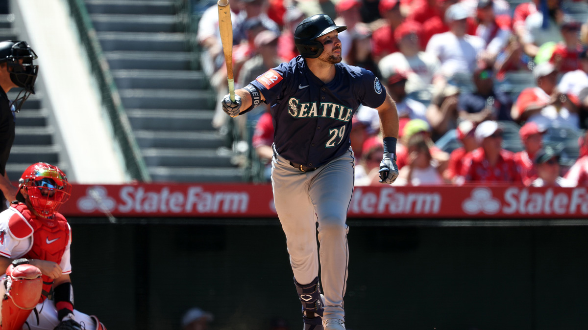 Seattle Mariners catcher Cal Raleigh (29) hits a home run during the seventh inning against the Los Angeles Angels at Angel Stadium.