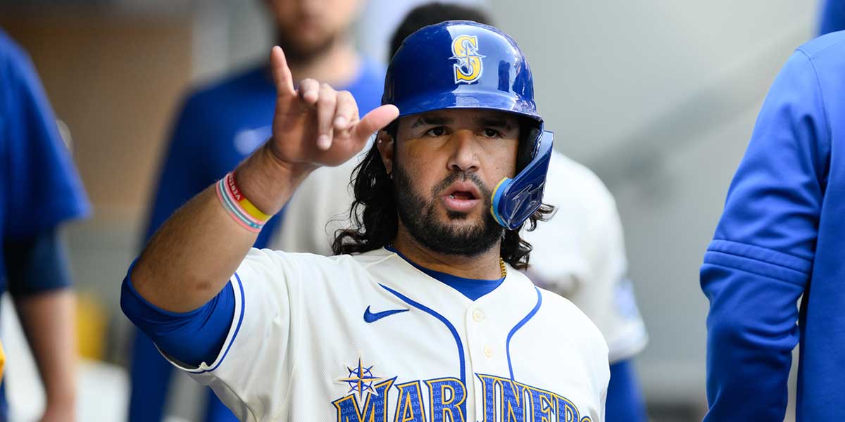 Seattle Mariners third baseman Eugenio Suarez (28) celebrates after scoring a run against the Los Angeles Dodgers during the second inning at T-Mobile Park.
