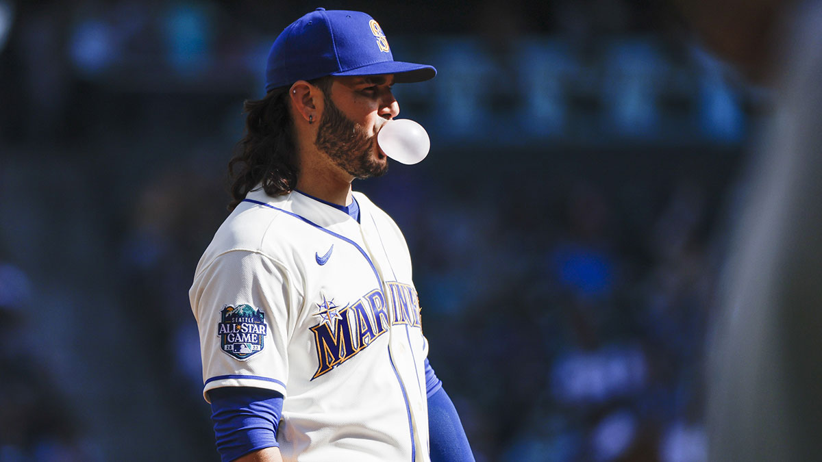 Oct 1, 2023; Seattle, Washington, USA; Seattle Mariners third baseman Eugenio Suarez (28) blows a bubble while waiting between pitches against the Texas Rangers during the second inning at T-Mobile Park.