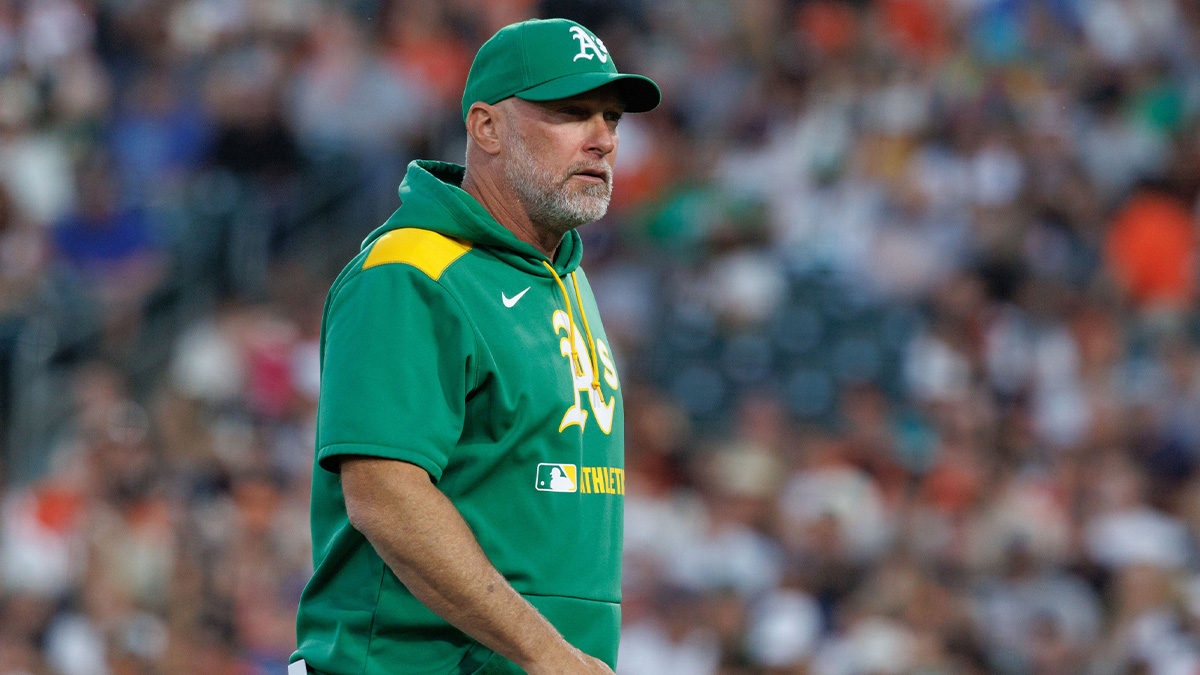 Athletics manager Mark Kotsay (7) walks back to the dugout during the fifth inning against the San Francisco Giants at Sutter Health Park.