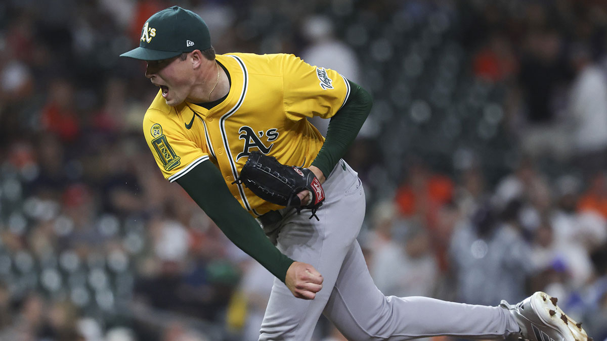 Athletics pitcher Mason Miller (19) delivers a pitch during the ninth inning against the Houston Astros at Daikin Park.