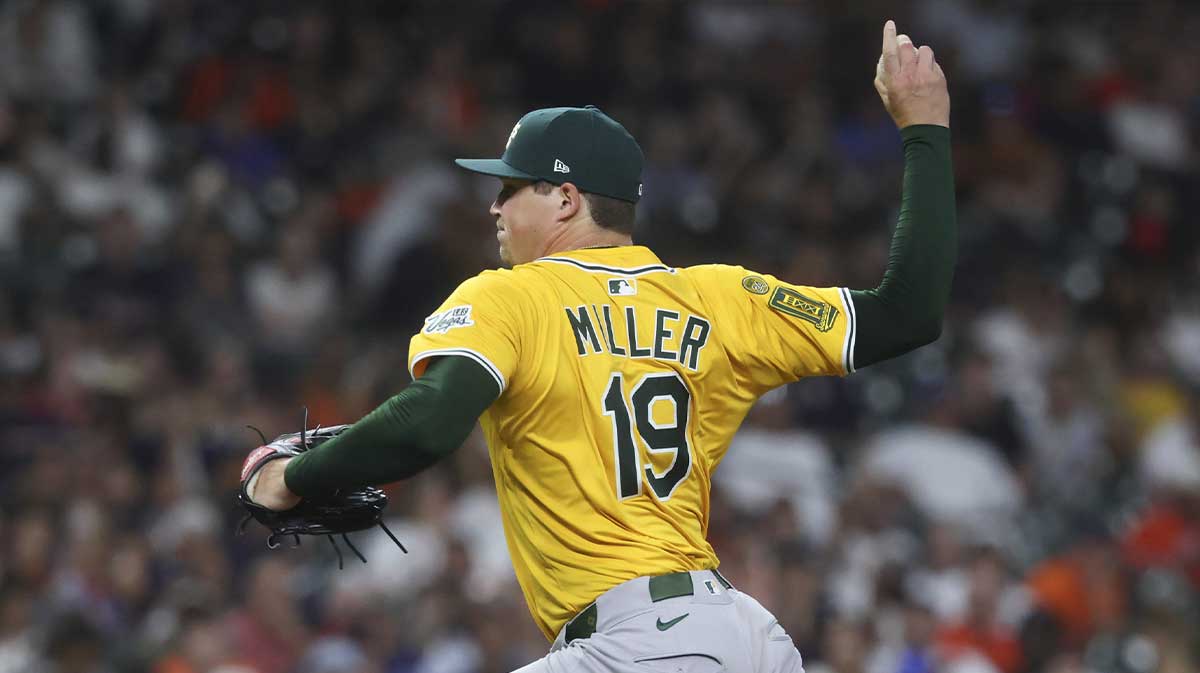 Athletics pitcher Mason Miller (19) delivers a pitch during the eighth inning against the Houston Astros at Daikin Park.