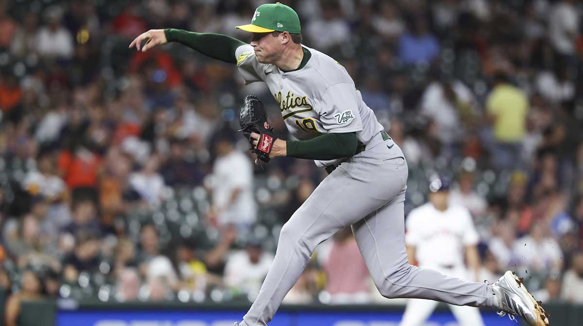 Athletics relief pitcher Mason Miller (19) delivers a pitch during the ninth inning against the Houston Astros at Daikin Park