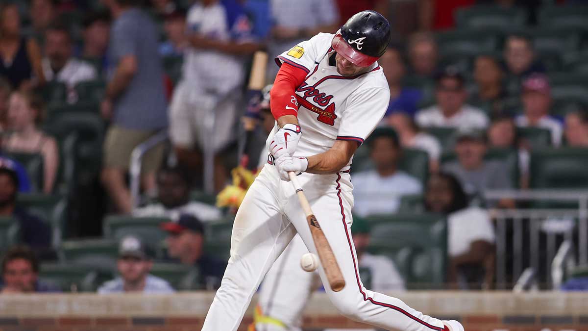 Atlanta Braves first baseman Matt Olson (28) hits a single against the San Francisco Giants in the seventh inning at Truist Park.