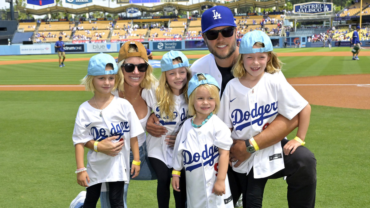 Los Angeles Rams quarterback Matthew Stafford (9) with his wife Kelly with their 4 daughters on the field prior to the game between the Los Angeles Dodgers and the Atlanta Braves at Dodger Stadium. Stafford was at the game on Rams day