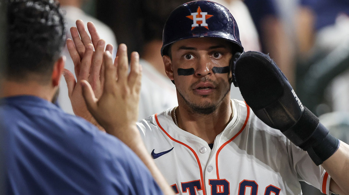 Houston Astros shortstop Mauricio Dubon (14) celebrates his run with teammates against the Cleveland Guardians in the eighth inning at Daikin Park.