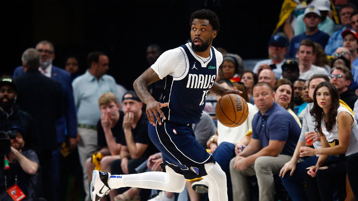 Mavericks forward Naji Marshall (13) dribbles during the second quarter against the Memphis Grizzlies at FedExForum