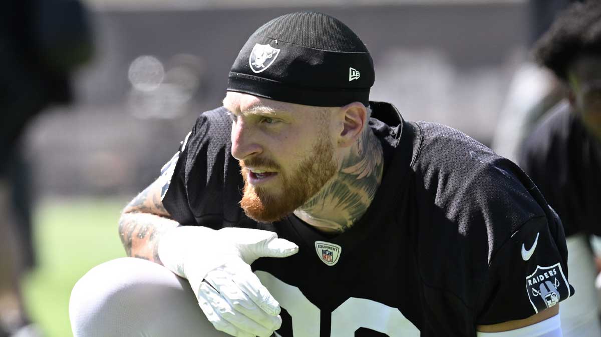 Las Vegas Raiders defensive end Maxx Crosby (98) looks on during the team stretch during Las Vegas Raiders Minicamp at Intermountain Health Performance Center.