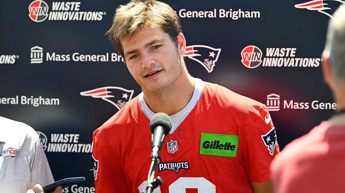 New England Patriots quarterback Drake Maye (10) addresses the media after practice during day one of training camp at Gillette Stadium.
