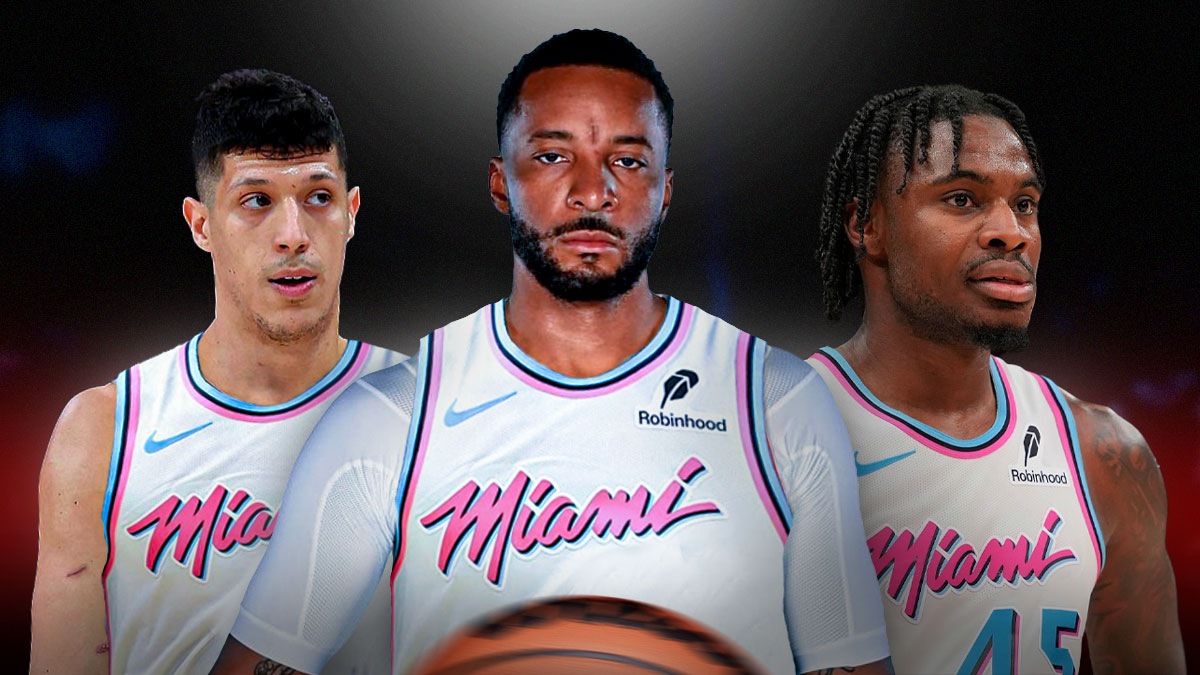 Miami Heat stars Norman Powell in the middle with Simone Fontecchio and Davion Mitchell on either side in front of Kaseya Center.