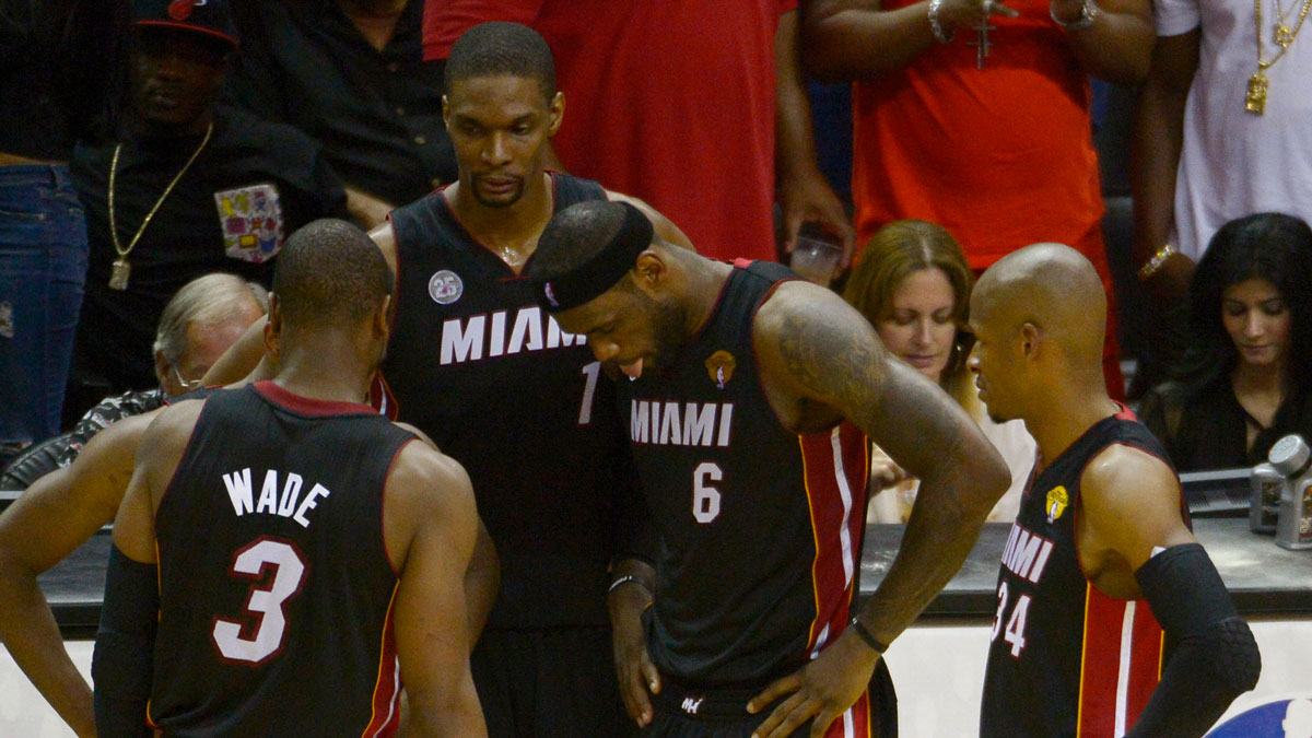Miami Heat shooting guard Dwyane Wade (3), LeBron James (6), Chris Bosh (1), and Ray Allen (34) talk during a time-out San Antonio Spurs during the second quarter of game four of the 2013 NBA Finals at the AT&T Center.