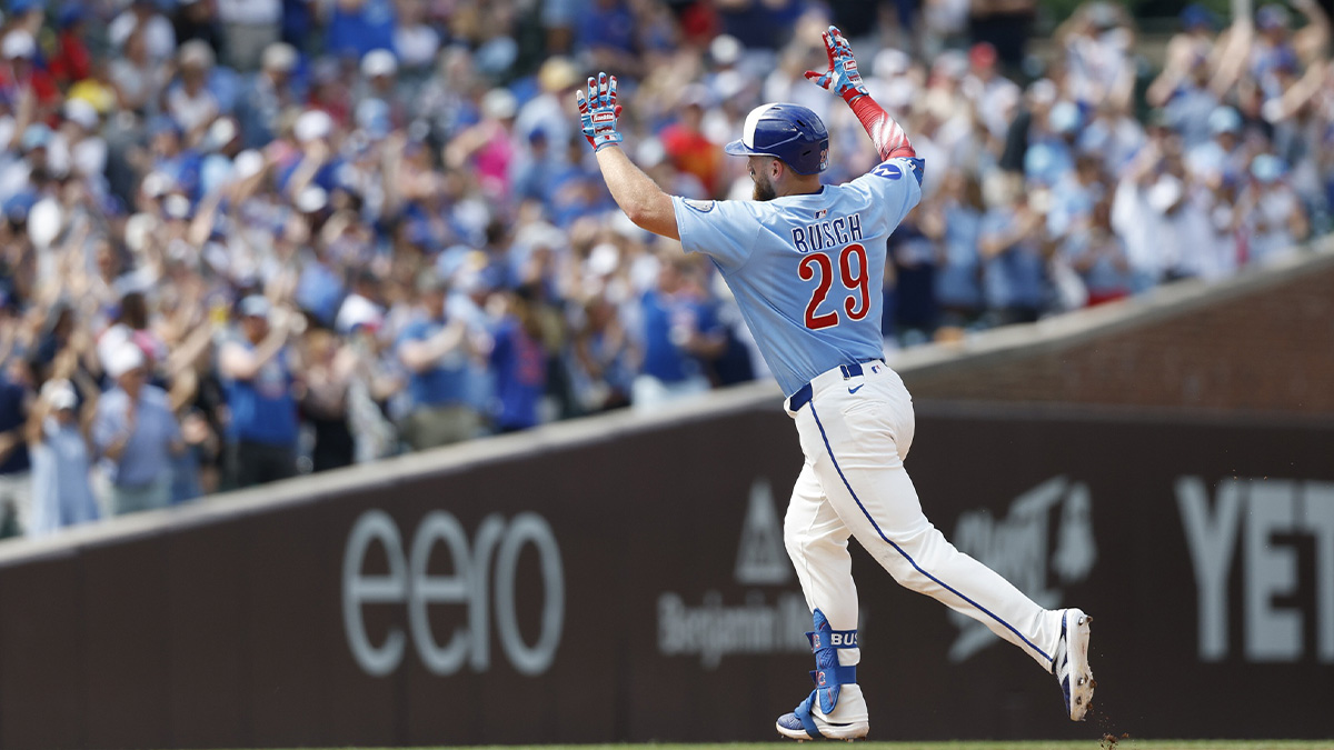Jul 4, 2025; Chicago, Illinois, USA; Chicago Cubs first baseman Michael Busch (29) rounds the bases after hitting a solo home run against the St. Louis Cardinals during the seventh inning at Wrigley Field. Mandatory Credit: Kamil Krzaczynski-Imagn Images