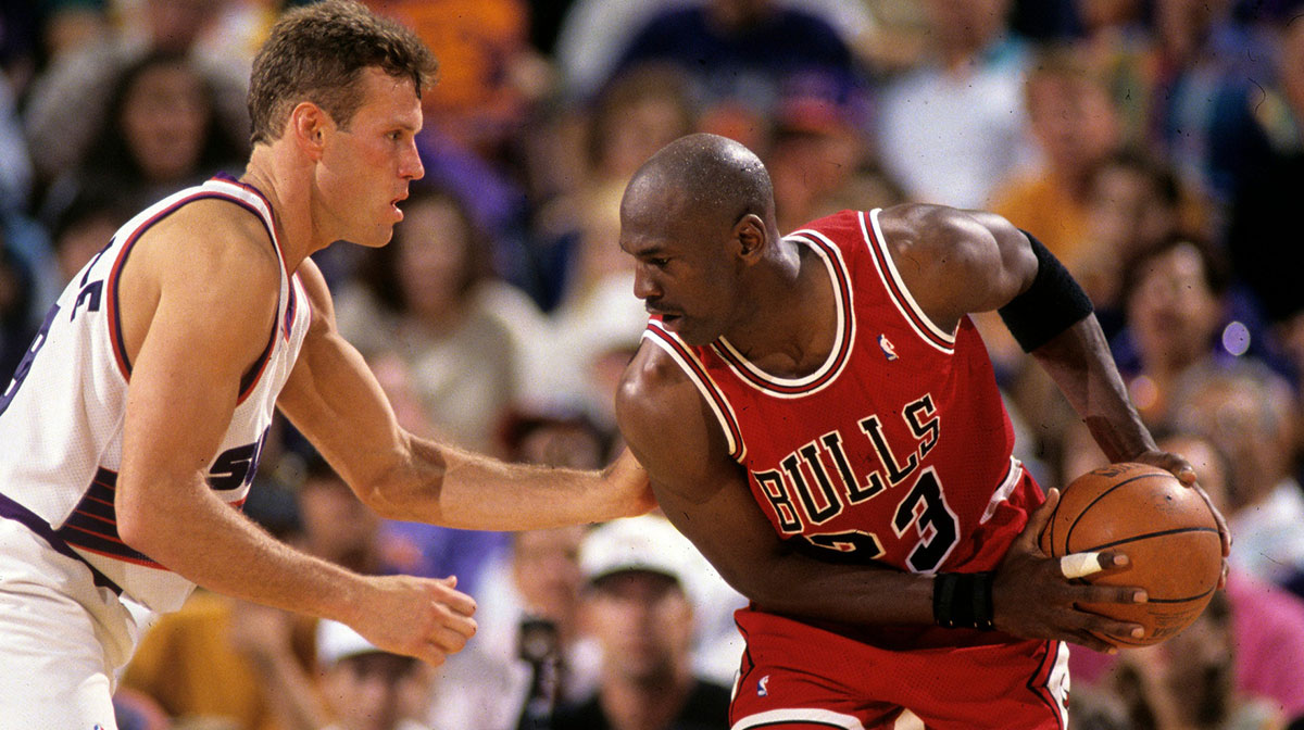 Suns guard Dan Majerle defends Bulls guard Michael Jordan during Game 1 of the NBA Finals in 1993 in Phoenix