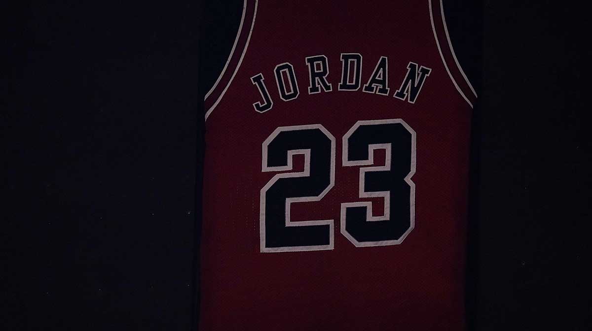 The jersey of former Chicago Bulls player Michael Jordan hangs from the rafters of the arena prior to the game between the Miami Heat and the Chicago Bulls at American Airlines Arena.