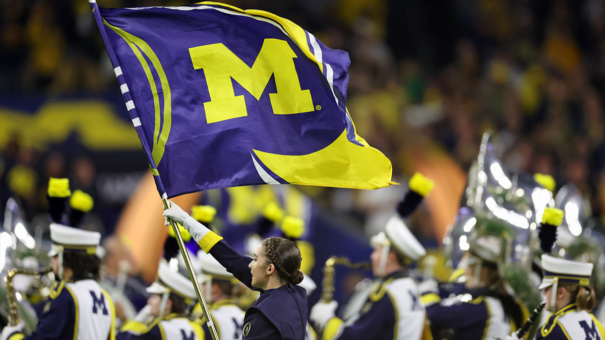 Members of the Michigan Wolverines marching band perform before the 2024 College Football Playoff national championship game against the Washington Huskies at NRG Stadium.