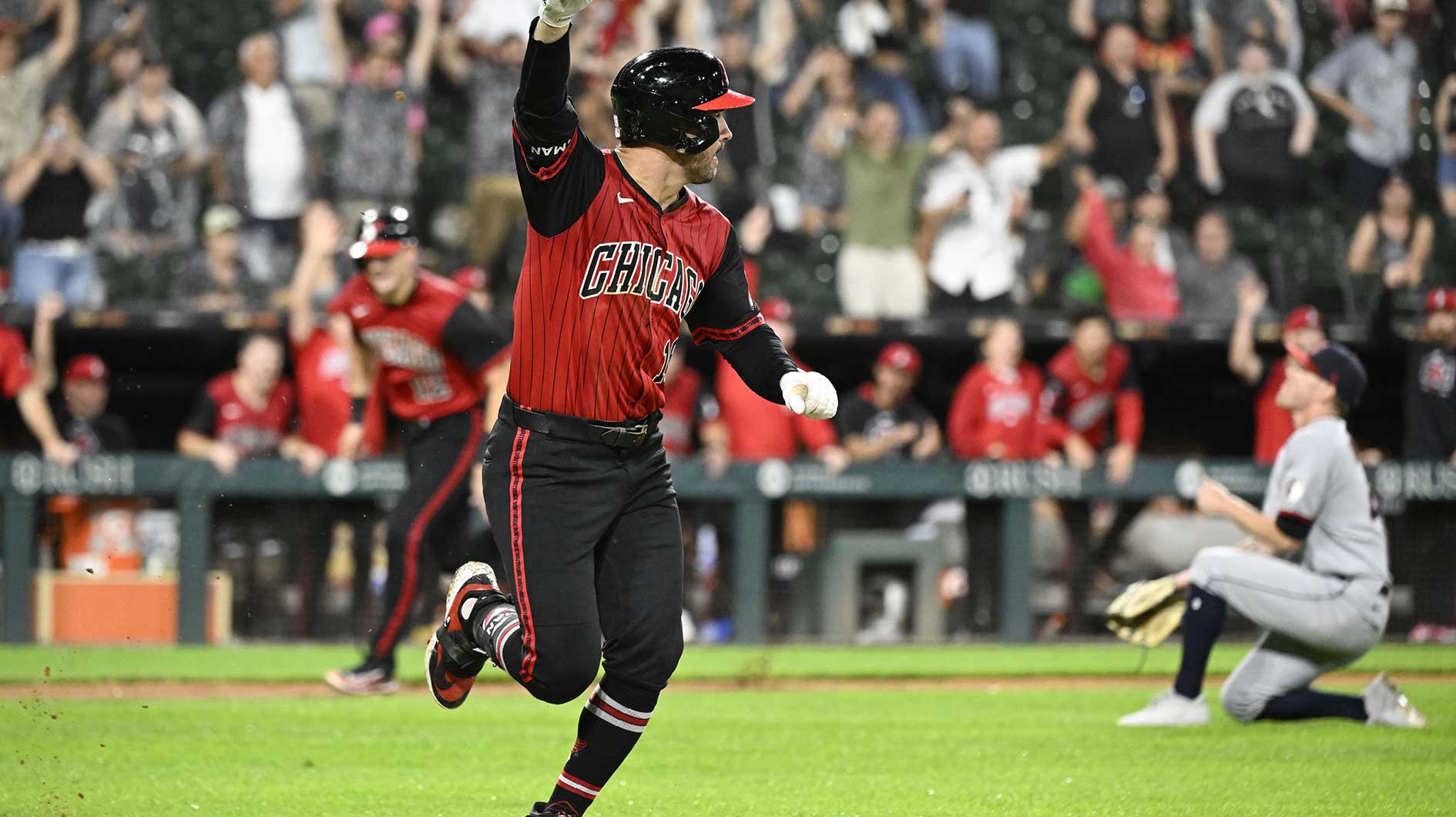 Chicago White Sox outfielder Mike Tauchman (18) points after he hits the game winning RBI single against the Cleveland Guardians during the eleventh inning at Rate Field.