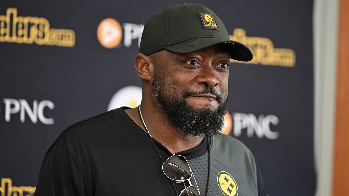 Pittsburgh Steelers head coach Mike Tomlin speaks to the media during training camp at Saint Vincent College .