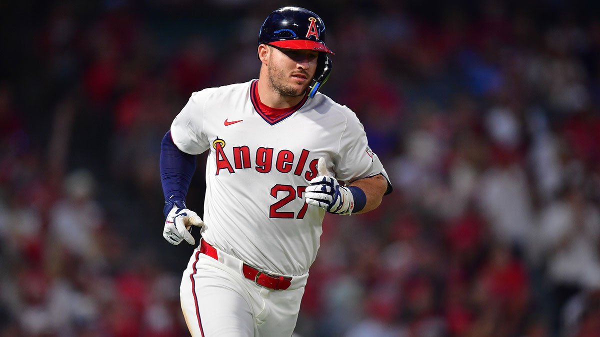 Jul 7, 2025; Anaheim, California, USA; Los Angeles Angels designated hitter Mike Trout (27) runs after hitting a single against the Texas Rangers during the fifth inning at Angel Stadium. Mandatory Credit: Gary A. Vasquez-Imagn Images