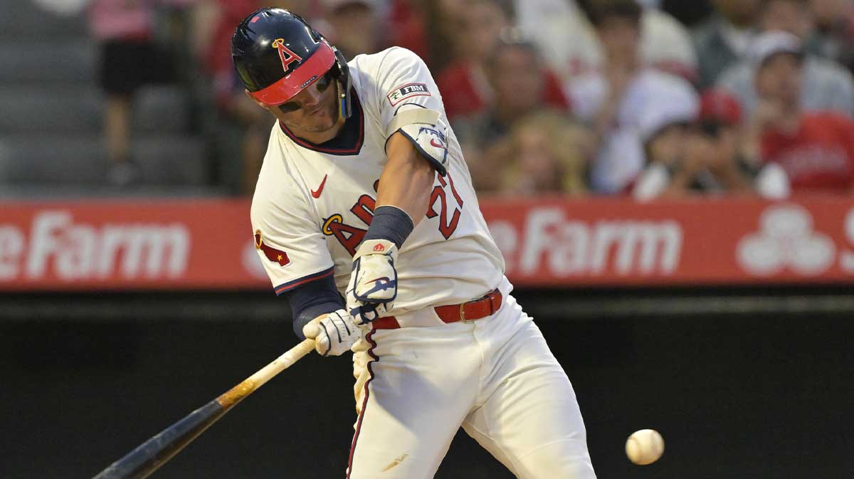 Jul 12, 2025; Anaheim, California, USA; Los Angeles Angels right fielder Mike Trout (27) hits a two-run home run during the fifth inning against the Arizona Diamondbacks at Angel Stadium.