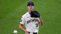 Milwaukee Brewers pitcher Jacob Misiorowski (32) warms up in the outfield prior to the game against the Los Angeles Dodgers at American Family Field.