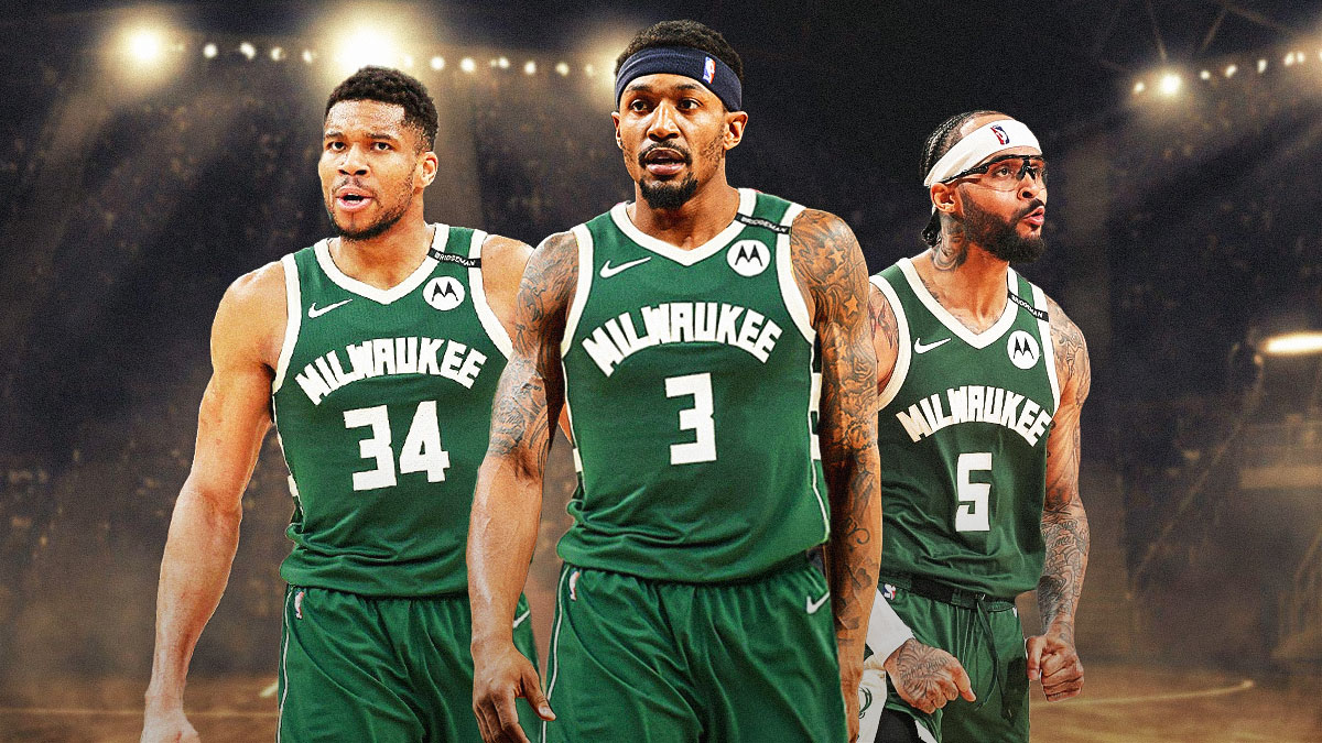 Bradley Beal wearing a Milwaukee Bucks jersey in the middle, Giannis Antetokounmpo and Gary Trent Jr around him