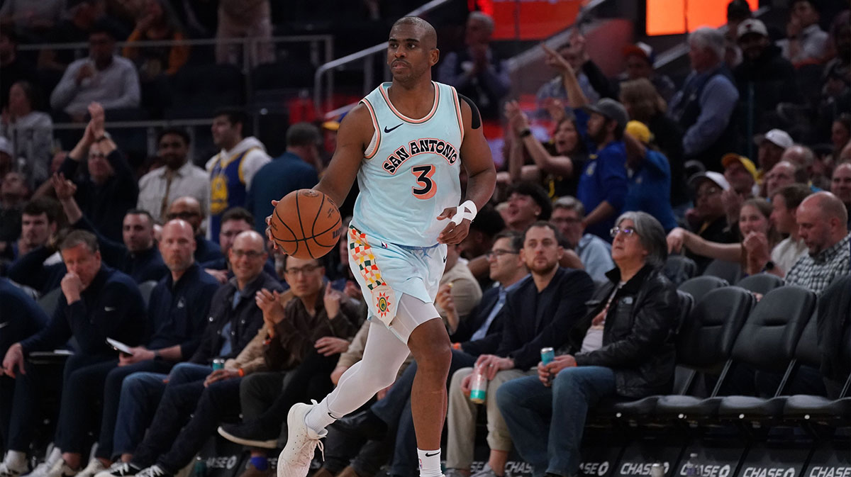 Apr 9, 2025; San Francisco, California, USA; San Antonio Spurs guard Chris Paul (3) dribbles upcourt against the Golden State Warriors in the third quarter at Chase Center.