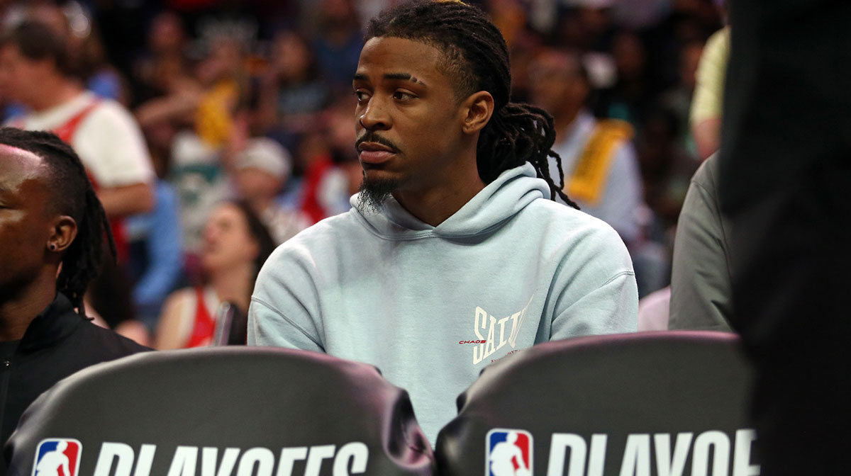 Memphis Grizzlies guard Ja Morant (12) looks on from the bench area during the fourth quarter against the Oklahoma City Thunder during game four for the first round of the 2024 NBA Playoffs at FedExForum.