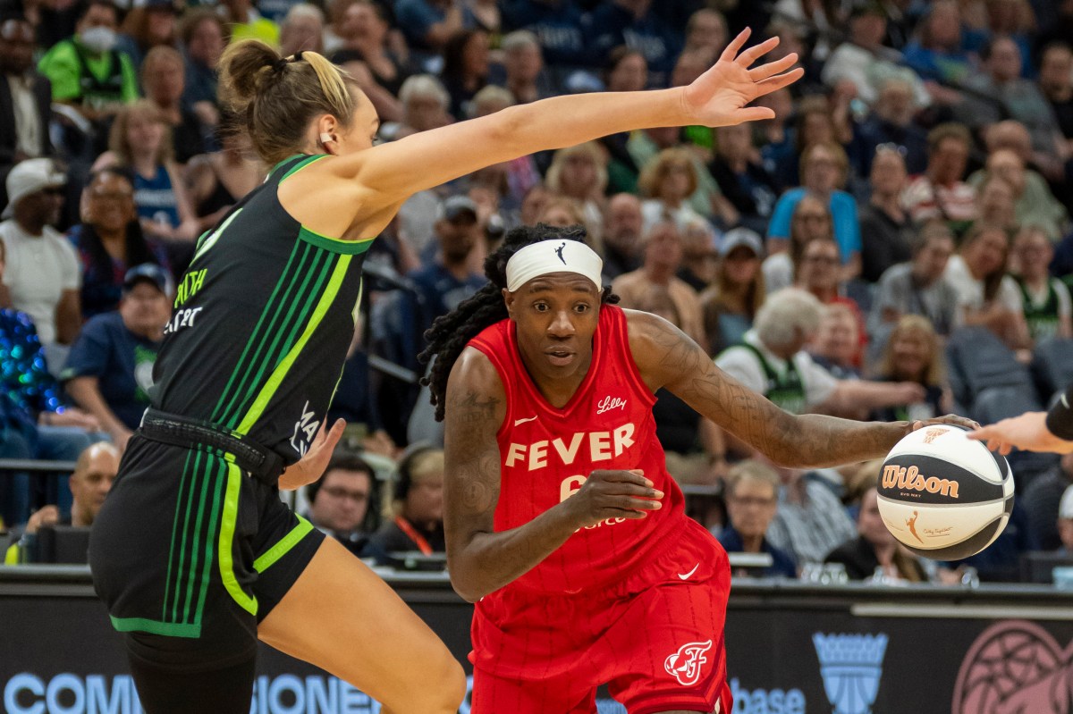Indiana Fever forward Natasha Howard (6) drives to the basket past Minnesota Lynx forward Alanna Smith (8) in the first half during the Commissioner's Cup final at Target Center.
