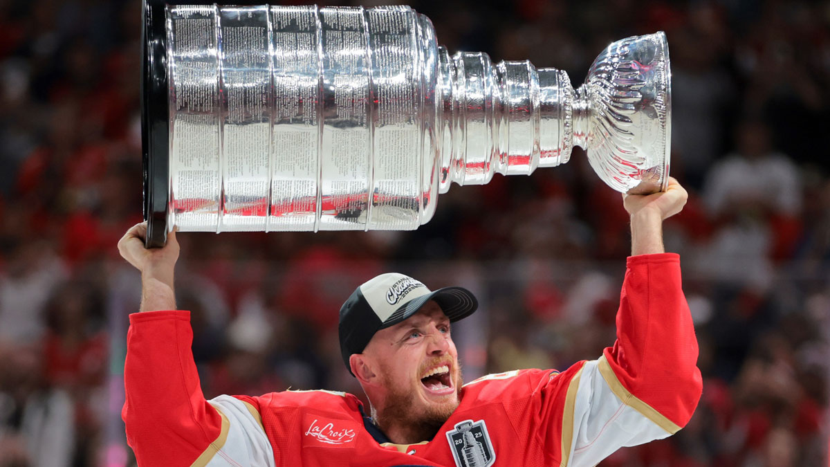 Florida Panthers defenseman Nate Schmidt (88) hoists the Stanley Cup after winning game six of the 2025 Stanley Cup Final against the Edmonton Oilers at Amerant Bank Arena.