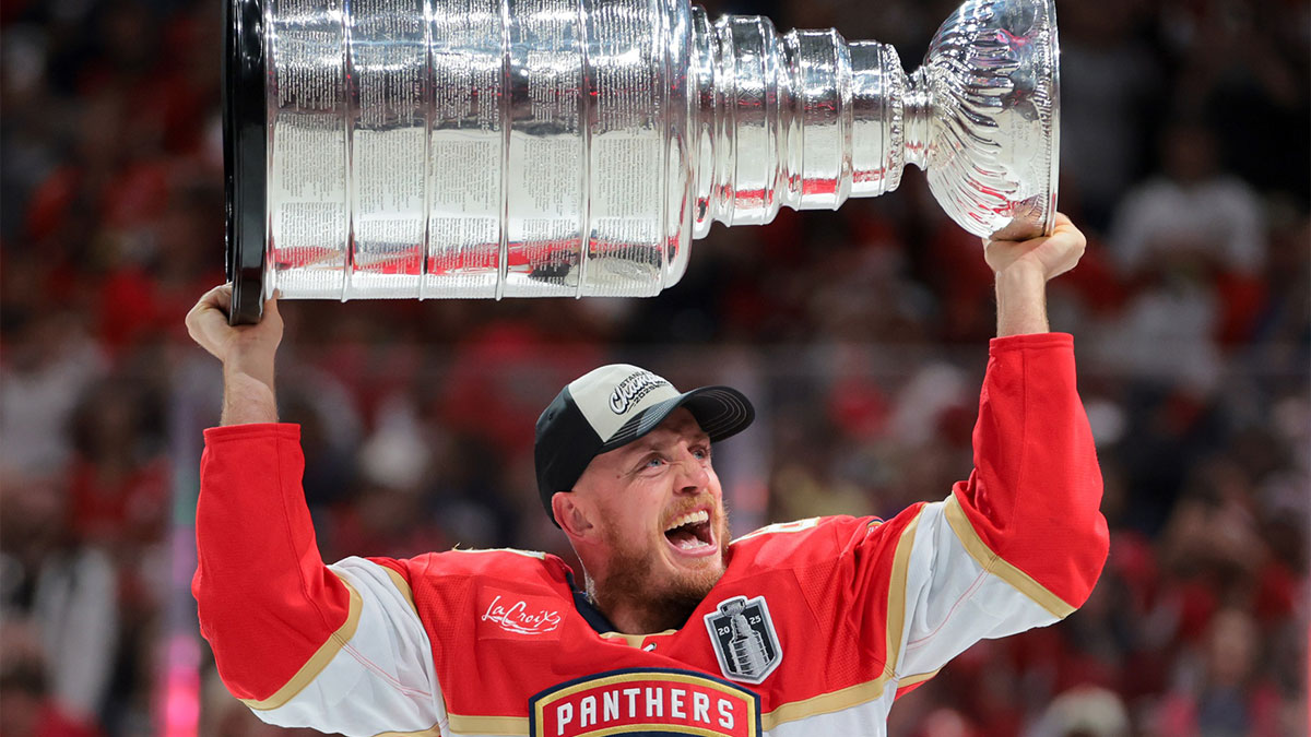 Florida Panthers defenseman Nate Schmidt (88) hoists the Stanley Cup after winning game six of the 2025 Stanley Cup Final against the Edmonton Oilers at Amerant Bank Arena.
