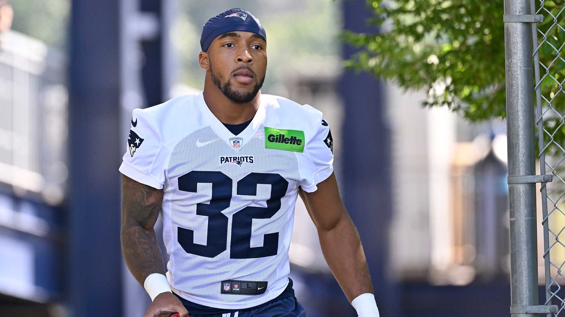 Foxborough, MA, USA; New England Patriots running back TreVeyon Henderson (32) walks to the practice field for training camp at Gillette Stadium.