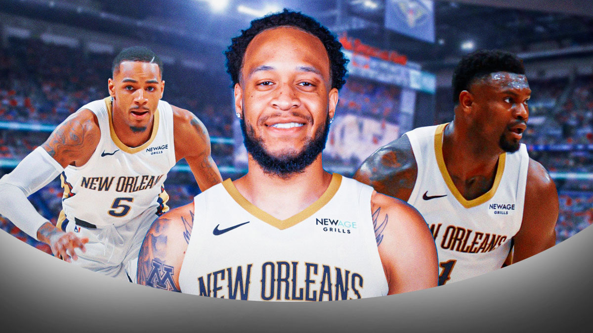 Amir Coffey wearing a New Orleans Pelicans jersey in the middle, Zion Williamson and Dejounte Murray around him