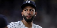 New York Yankees third baseman Amed Rosario (14) looks out from the dugout during the sixth inning against the Tampa Bay Rays at Yankee Stadium.