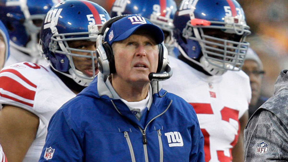 New York Giants head coach Tom Coughlin watches a replay during the first quarter of their game against the Green Bay Packers Sunday, December 26, 2010 at Lambeau Field in Green Bay, Wis. Mjs Packers27 24 Of Hoffman Jpg Packers27
