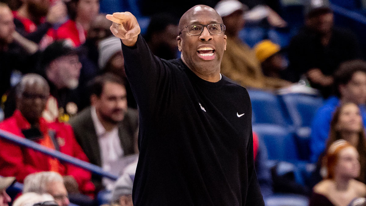 Sacramento Kings head coach Mike Brown gives direction as he stands on the court against the New Orleans Pelicans during the first half at Smoothie King Center.