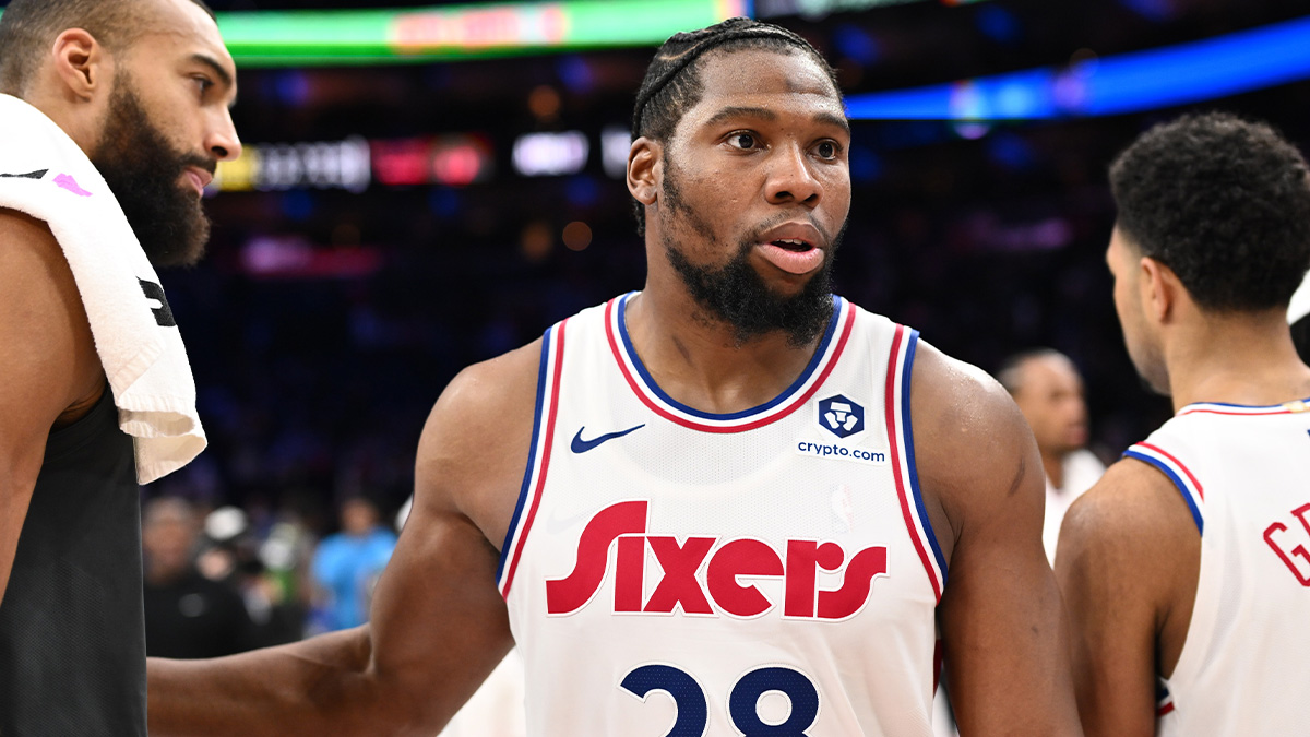 Philadelphia 76ers forward Guerschon Yabusele (28) looks on with Minnesota Timberwolves center Rudy Gobert (27) after the game at Wells Fargo Center.