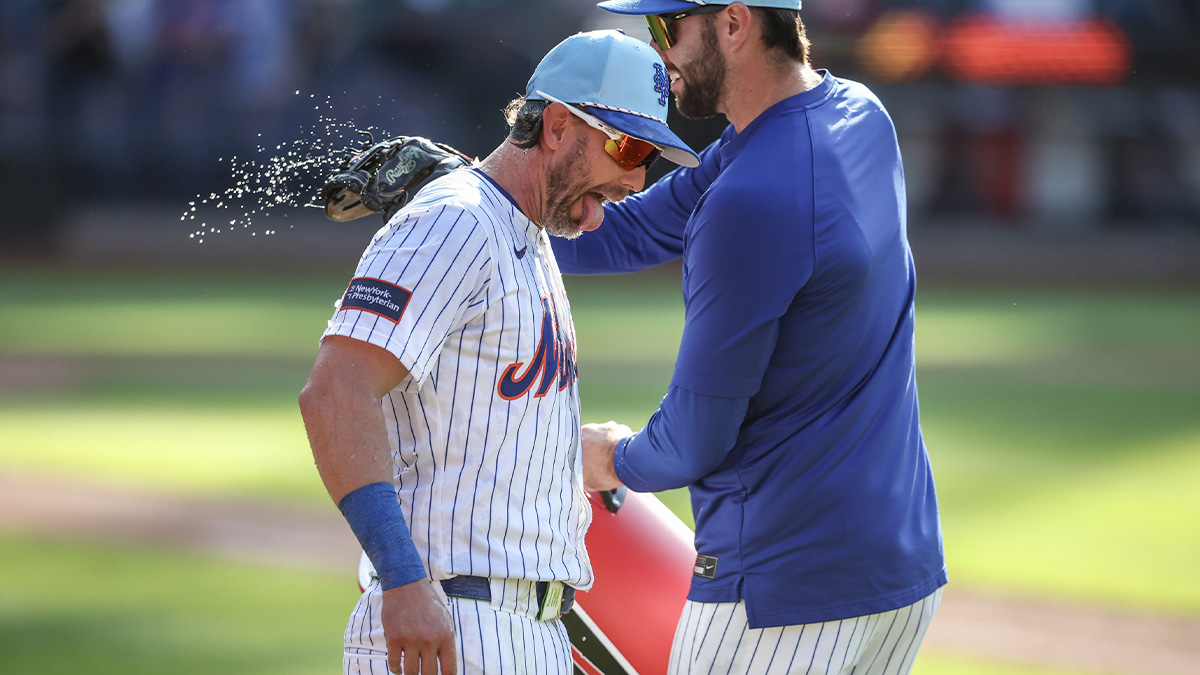 New York Mets second baseman Jeff McNeil (1) reacts after getting doused with water following the 6-5 win over the New York Yankees at Citi Field.