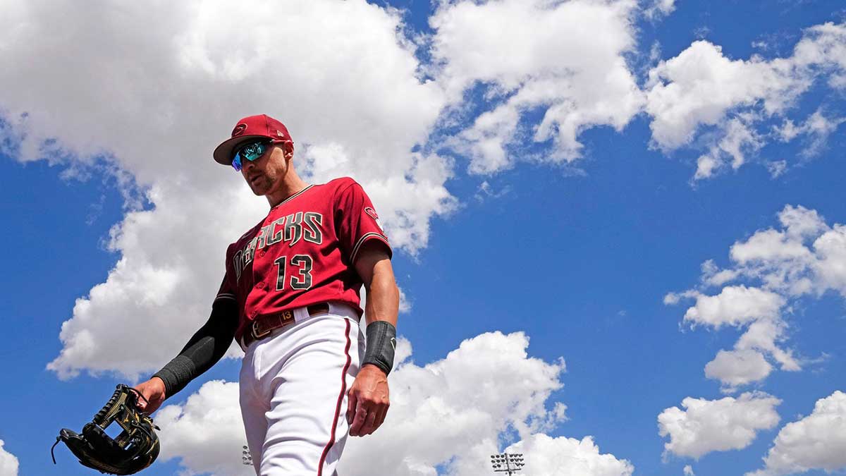 Arizona Diamondbacks shortstop Nick Ahmed enters the dugout before their spring training game against the Los Angeles Dodgers at Salt River Fields on Mar 23, 2023.