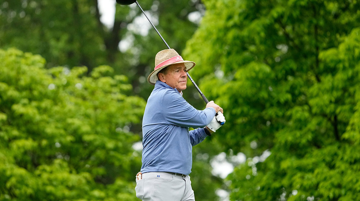 Former Alabama head football coach Nick Saban tees off on No. 14 during the Workday Golden Bear Pro-Am at Muirfield Village Golf Club in Dublin, Ohio
