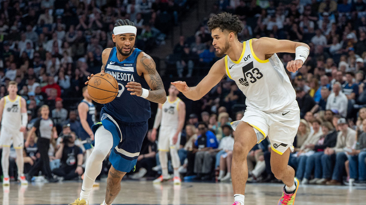 Minnesota Timberwolves guard Nickeil Alexander-Walker (9) steals the ball and is defended by Utah Jazz guard Johnny Juzang (33) in the second quarter at Target Center.
