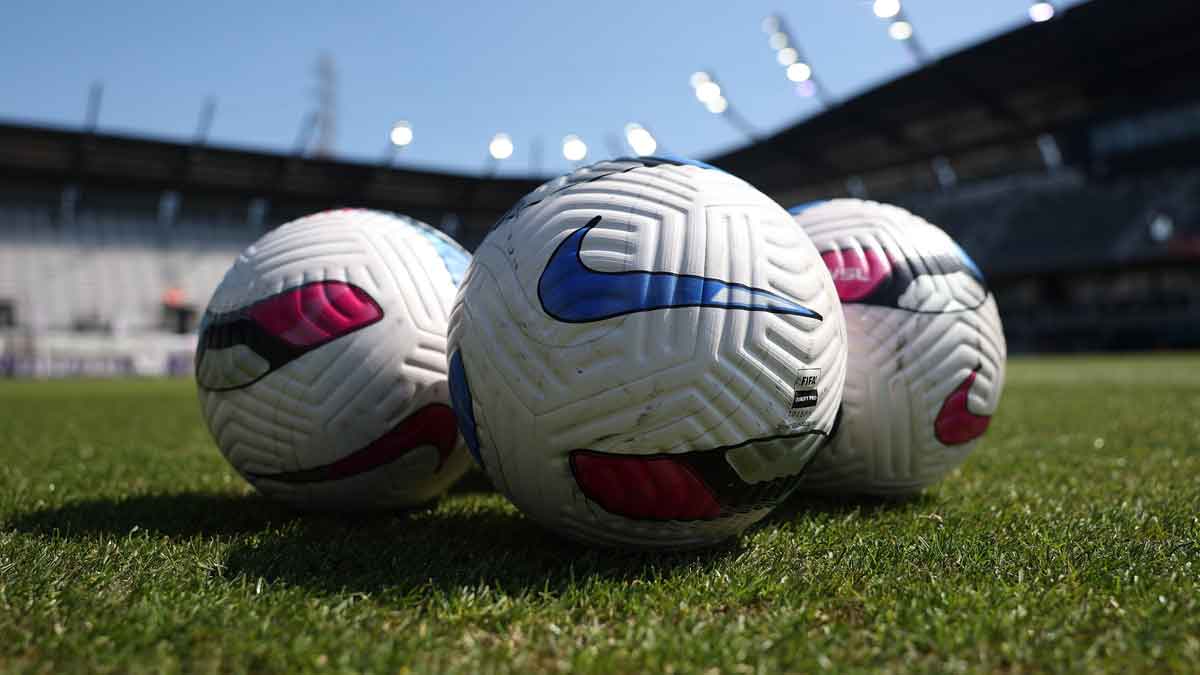 WAFCON Nike soccer balls sit on the field before the game between Racing Louisville FC and Washington Spirit at Lynn Family Stadium.