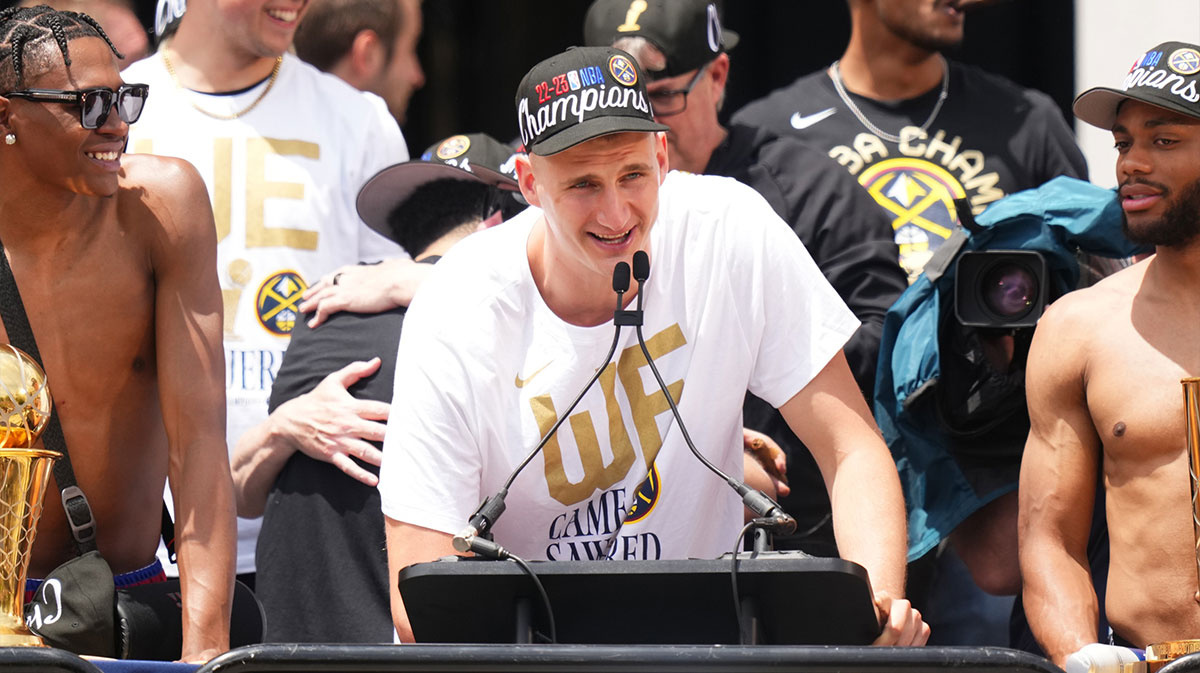 The center of Denver Nuggets Nikola Jokic (15) speaks during the championship parade after the Denver Nuggets won the NBA 2023 final.
