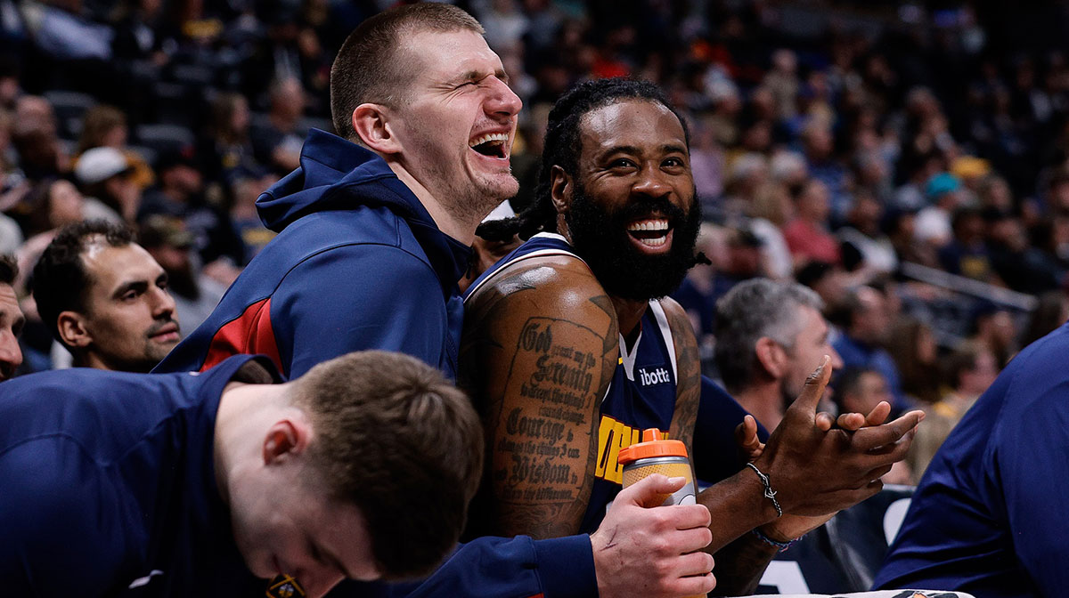 Denver Nuggets center Nikola Jokic (15) and center DeAndre Jordan (6) in the fourth quarter against the Memphis Grizzlies at Ball Arena.