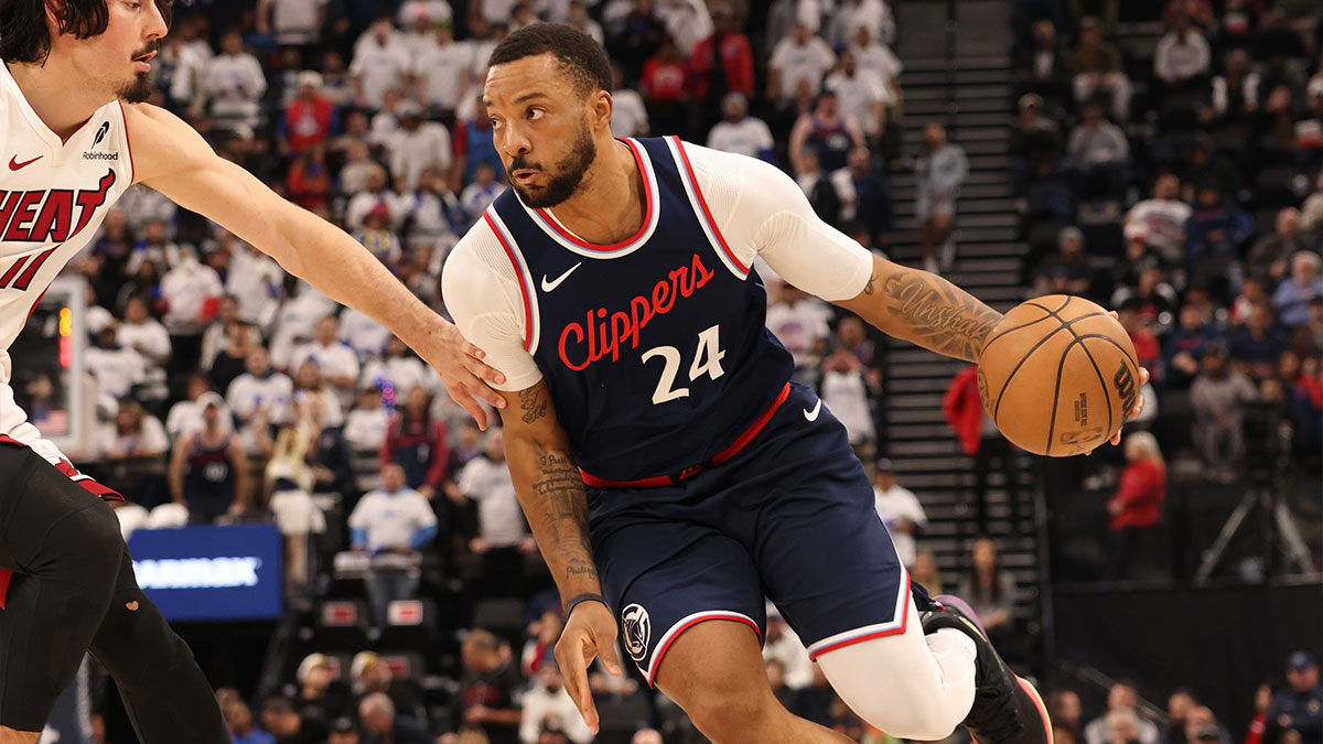 LA Clippers guard Norman Powell (24) drives against Miami Heat guard Jaime Jaquez Jr. (11) during the second quarter at Intuit Dome.