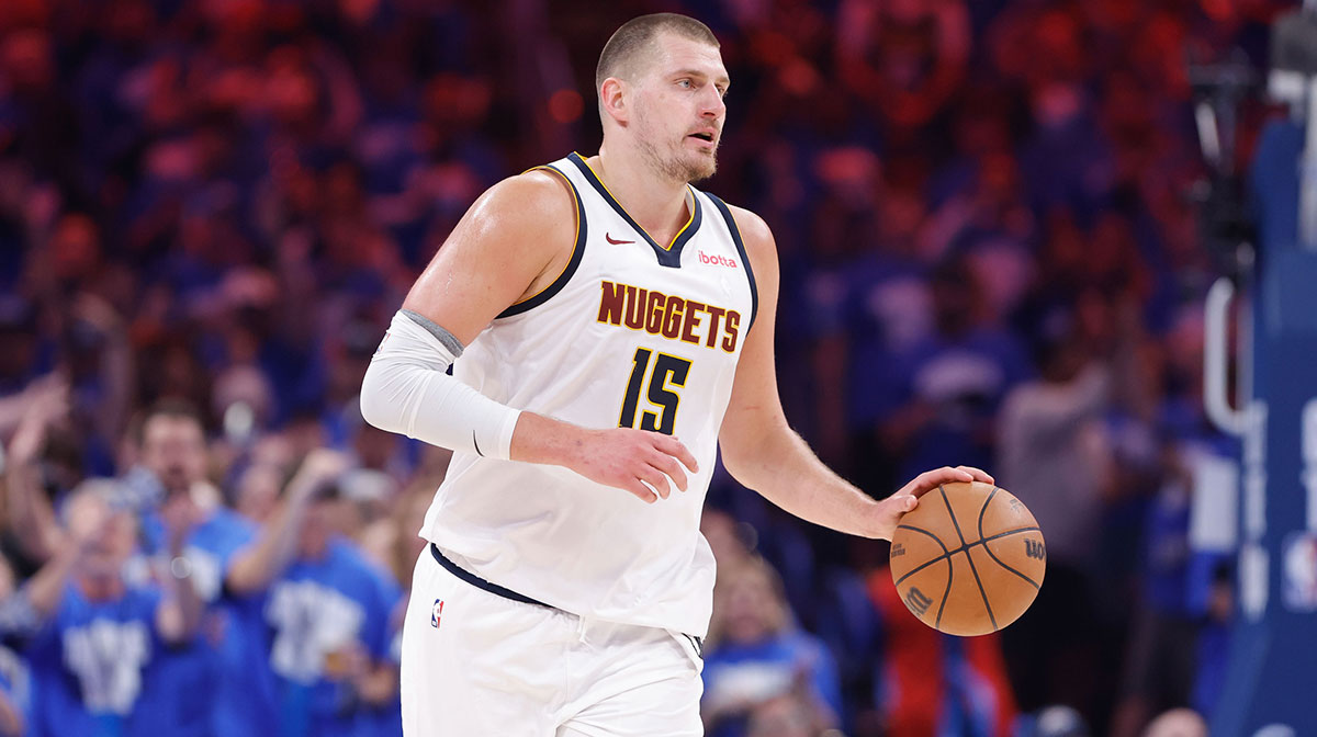 Denver Nuggets center Nikola Jokic (15) dribbles down the court against the Oklahoma City Thunder in the second quarter during game seven of the second round for the 2025 NBA Playoffs at Paycom Center.
