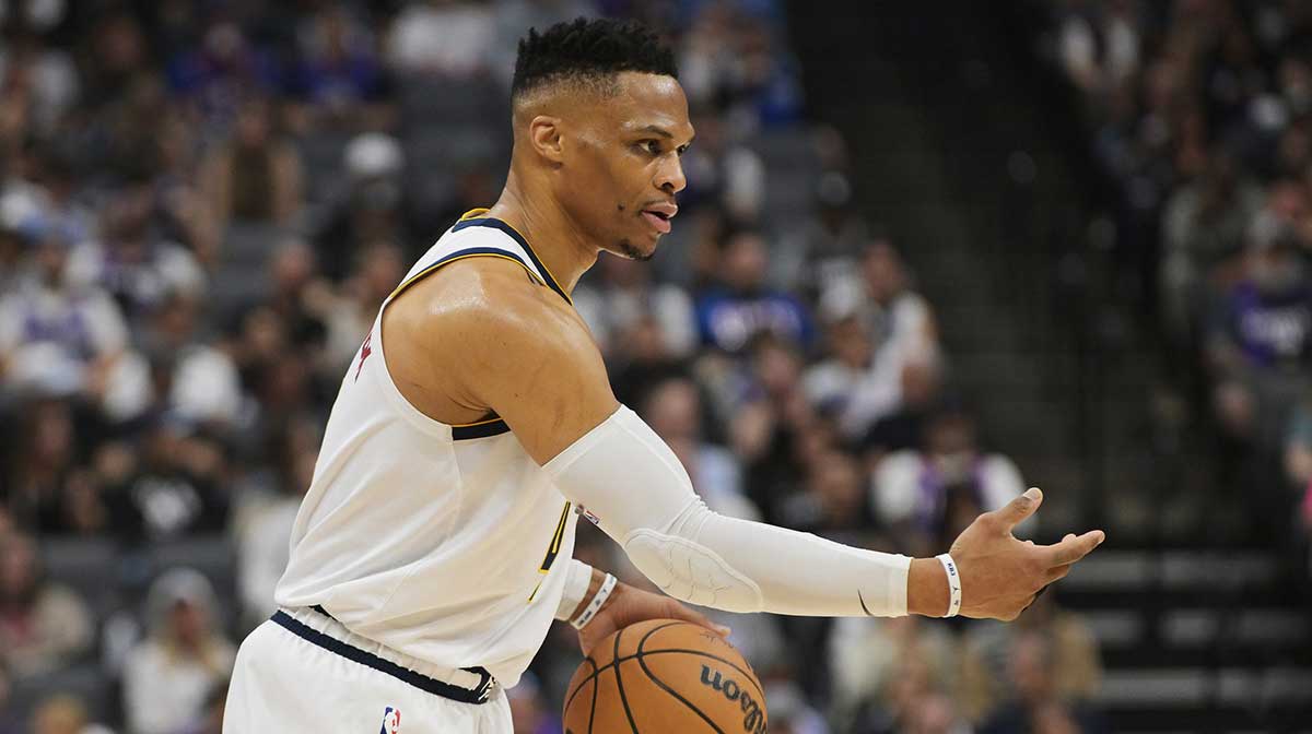 Nuggets guard Russell Westbrook (4) directs his team against the Sacramento Kings during the first quarter at Golden 1 Center