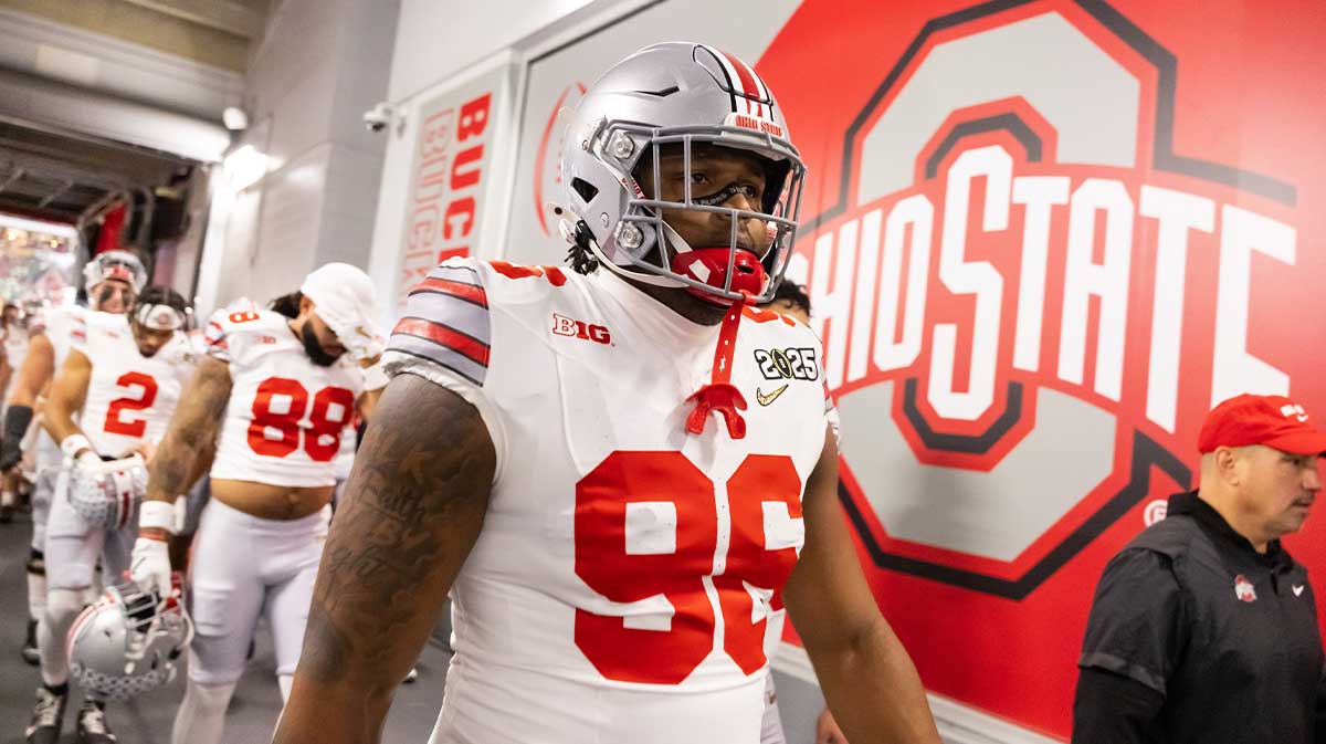Ohio State Buckeyes defensive end Eddrick Houston (96) against the Notre Dame Fighting Irish during the CFP National Championship college football game at Mercedes-Benz Stadium.